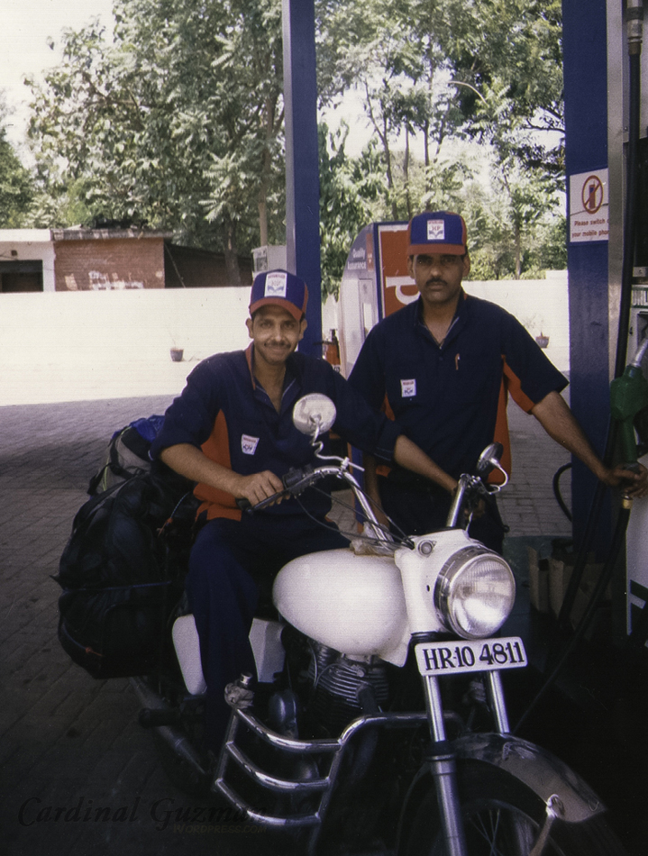 Petrol Station employees; happy to pose for a photo.